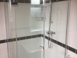 Shower enclosure with a hinged door: Click Here To View Larger Image